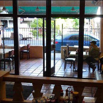 The Smoke Cafe - From the upper section, I could look out the front door into the small, gated patio the restaurant offers, which includes several tables. - American Near Me - Jamestown, California The Smoke Cafe - From the upper section, I could look out the front door into the small, gated patio the restaurant offers, which includes several tables. - American Near Me - Jamestown, California