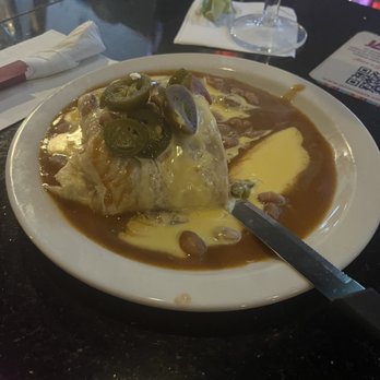 Jalisco's Restaurant and Bar - Jefe burrito (half) - Mexican Near Me - Austin, Texas Jalisco's Restaurant and Bar - Jefe burrito (half) - Mexican Near Me - Austin, Texas