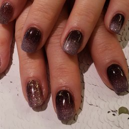 Fantastic salon! Great atmosphere & beautiful place to go.  Loving my ombre dip nails!