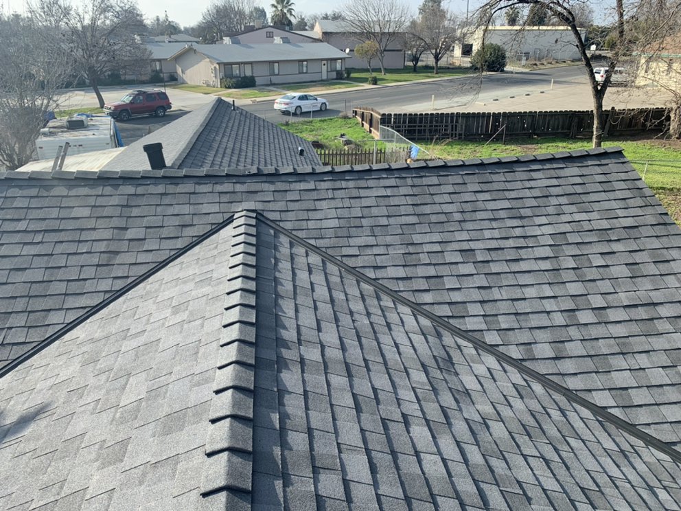 Slide of JAG Roofing