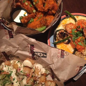 Jake Melnick's Corner Tap - Titanic Truffle Tots ($8.95), Mac Daddy Mac n' Cheese ($10.95) (April 2017 special), Firecracker Wings ($12.95) - Sports Bars Near Me - Chicago, Illinois