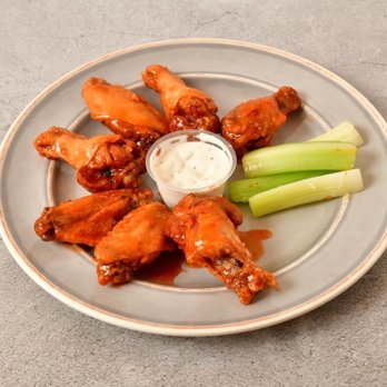 America's Best Wings - Wheaton - a plate of chicken wings and celery - Chicken Wings Near Me - Wheaton, Maryland America's Best Wings - Wheaton - a plate of chicken wings and celery - Chicken Wings Near Me - Wheaton, Maryland