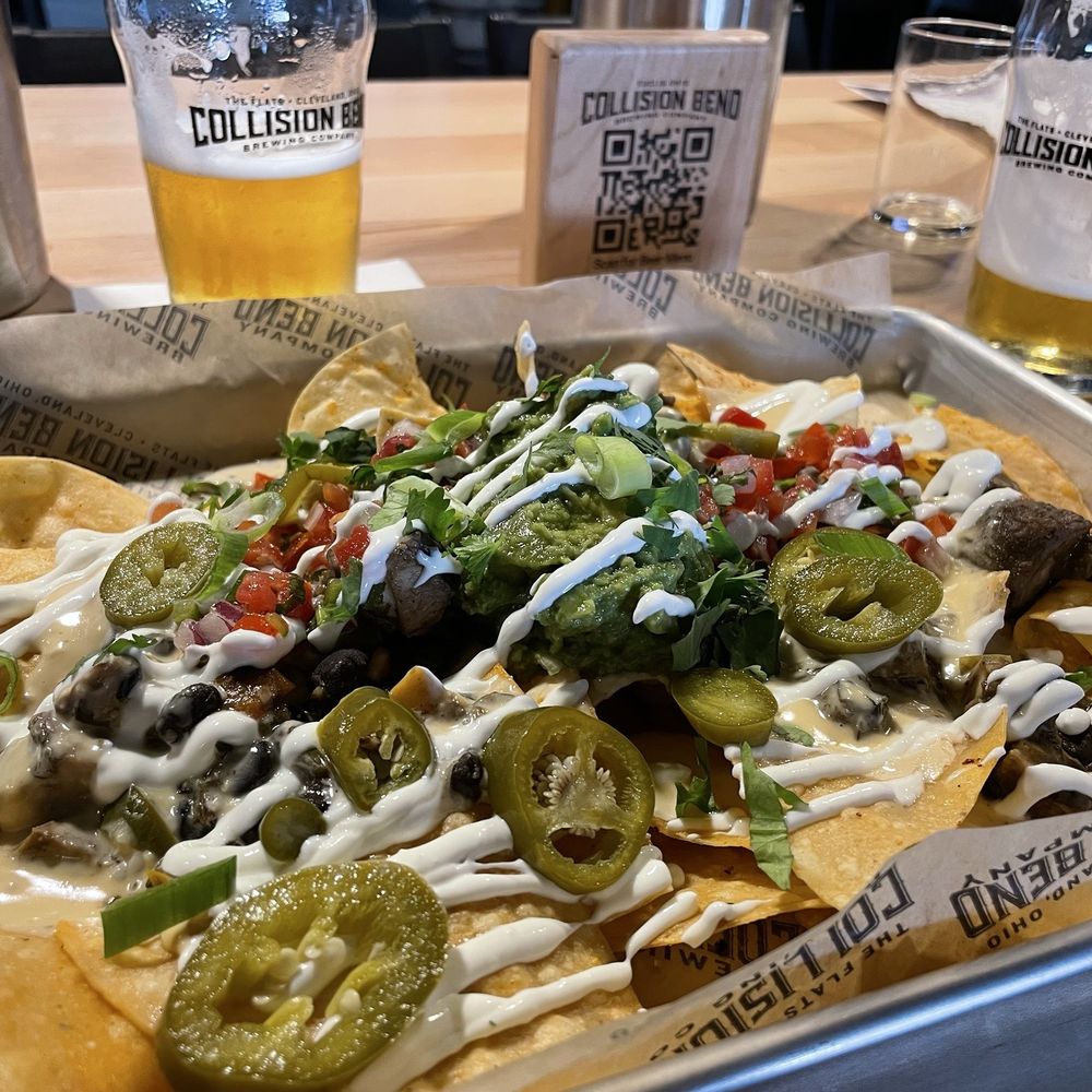 Sheet tray nachos with Jerk Chicken. Was a great choice. I usually don't like diced tomatoes. But it all went well together. Sheet tray nachos with Jerk Chicken. Was a great choice. I usually don't like diced tomatoes. But it all went well together.