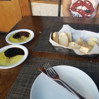 Francoli Gourmet - Complimentary bread with oil & vinegar - Italian Near Me - Orange, California Francoli Gourmet - Complimentary bread with oil & vinegar - Italian Near Me - Orange, California
