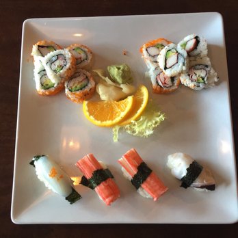 Siam Orchid Cocoa Beach - California roll, two pieces of crab nigiri, a piece of octopus nigiri, & a piece of squid sashimi. This sushi was incredible!!! - Sushi Bars Near Me - Cocoa Beach, Florida