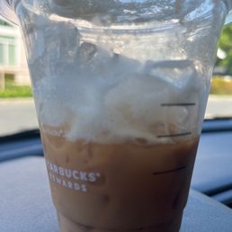 Tall brown sugar oatmilk latte, mostly ice.