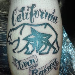 Ink Garage - First tattoo for Alex...right calf