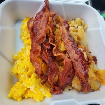 Paul's Place - A 3 egg breakfast, breakfast potatoes, and 4 slices of bacon, with toast not seen. - Breakfast & Brunch Near Me - Oceanside, California