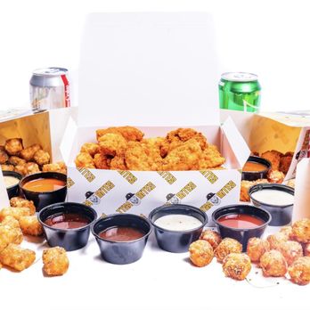 Tyga Bites - a box of chicken nuggies and a box of sodas - Comfort Food Near Me Tyga Bites - a box of chicken nuggies and a box of sodas - Comfort Food Near Me