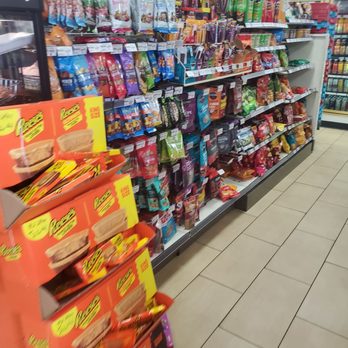 7-Eleven - a grocery store aisle filled with snacks - Convenience Stores Near Me - Linden, New Jersey