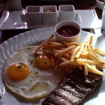 Bistro Cacao - Steak and eggs with eggs beg bn verdict inn the background - French Near Me - Washington, DC, District of Columbia