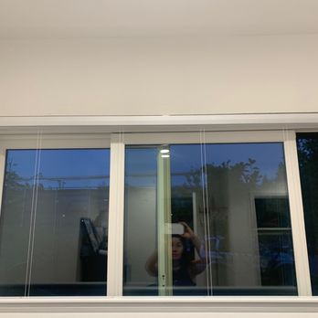 Nichelini & Sons, Inc - a woman taking a selfie through a window - General Contractors Near Me - San Anselmo, California Nichelini & Sons, Inc - a woman taking a selfie through a window - General Contractors Near Me - San Anselmo, California