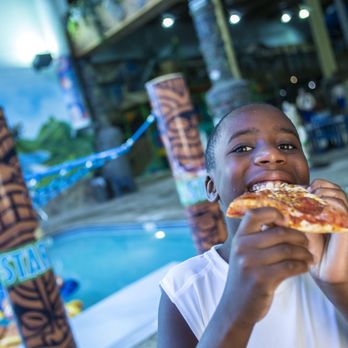 Edgewater Hotel and Waterpark - Pizza available at Tiki Tom's Grill in the Waterpark. - Hotels Near Me - Duluth, Minnesota Edgewater Hotel and Waterpark - Pizza available at Tiki Tom's Grill in the Waterpark. - Hotels Near Me - Duluth, Minnesota