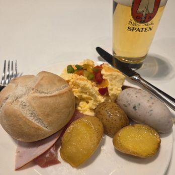 Lufthansa Business Lounge Schengen - Lunch of eggs, cold meats, roasted potatoes, white sausage, and beer. - Airport Lounges Near Me - Munich, BY