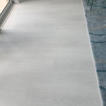 Sarasota Carpet & Flooring - A sample view of the luxury vinyl planks and the new carpet. - Carpet Installation Near Me - Sarasota, Florida Sarasota Carpet & Flooring - A sample view of the luxury vinyl planks and the new carpet. - Carpet Installation Near Me - Sarasota, Florida