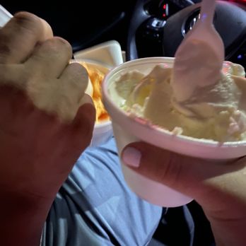 Charlie's Ice Cream - 2 scoops of coconut ice cream and my husband has orange pineapple - Ice Cream & Frozen Yogurt Near Me - Hialeah, Florida