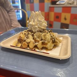 Waffle with bananas, pecans, and salted caramel
