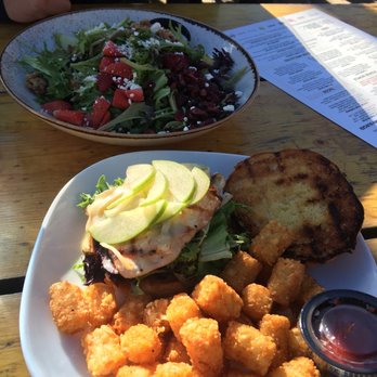 Kickapoo Tavern - Chicken and Brie sandwich with the montezuma salad - American Near Me - Keystone, Colorado