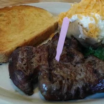 Steak Corral - Filet Mignon medium rare, baked potato w/sour cream, butter & cheese. Delicious cheese bread to compliment the meal. - Steakhouses Near Me - Whittier, California Steak Corral - Filet Mignon medium rare, baked potato w/sour cream, butter & cheese. Delicious cheese bread to compliment the meal. - Steakhouses Near Me - Whittier, California