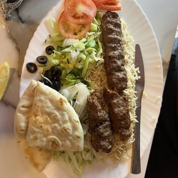 Ariana Gyros & Grill - Seekh Kabob - fresh ground beef with onion and garlic - comes with basmati rice and salad - Mediterranean Near Me - Vacaville, California Ariana Gyros & Grill - Seekh Kabob - fresh ground beef with onion and garlic - comes with basmati rice and salad - Mediterranean Near Me - Vacaville, California