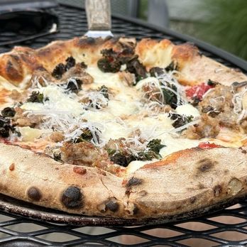 Mockingbird Bar + Garden - Fennel and Sausage Wood Fired Pizza - Cocktail Bars Near Me - East Dundee, Illinois Mockingbird Bar + Garden - Fennel and Sausage Wood Fired Pizza - Cocktail Bars Near Me - East Dundee, Illinois