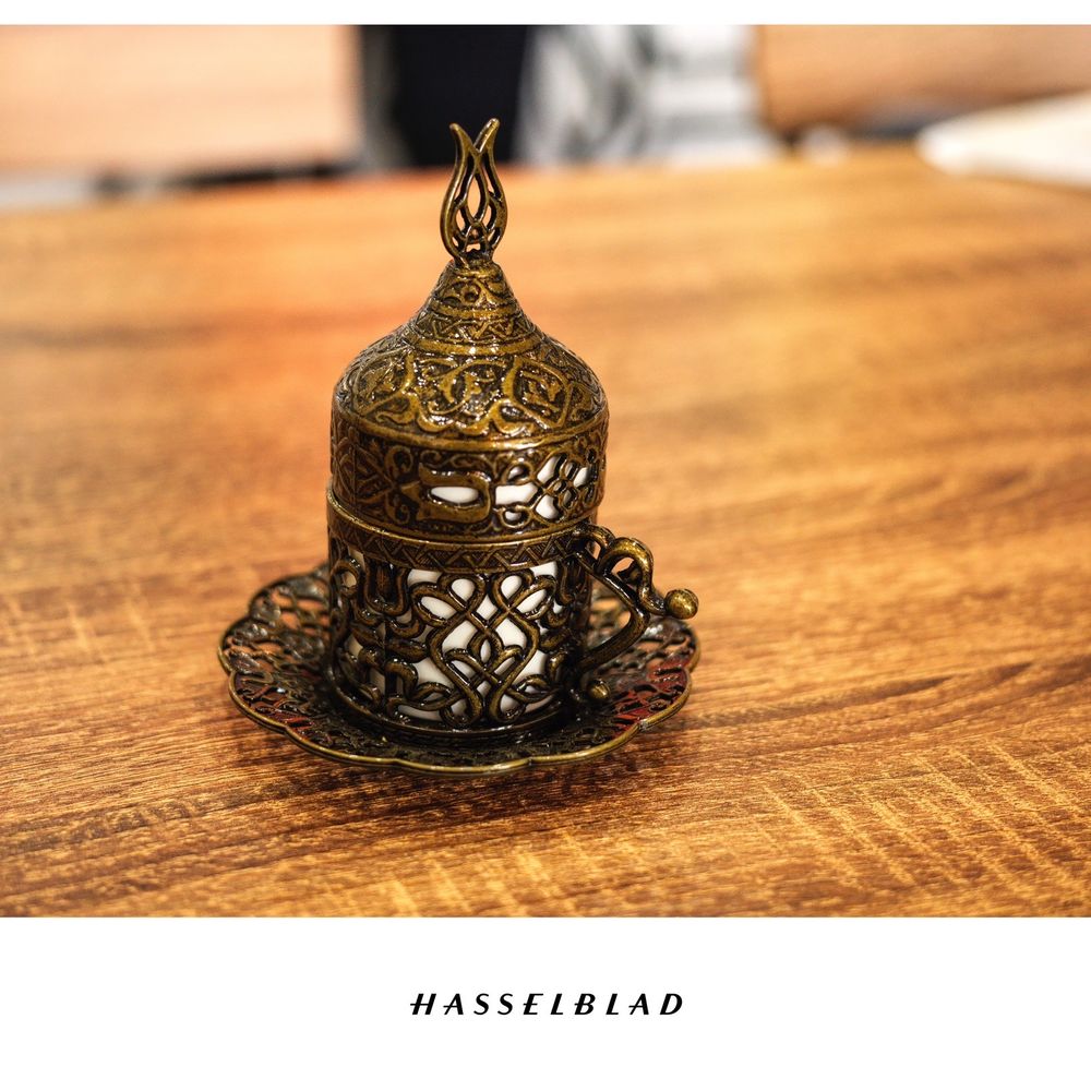 Mokha Cafe - a brass teapot on a wooden table - Coffee & Tea Near Me - Bakersfield, California Mokha Cafe - a brass teapot on a wooden table - Coffee & Tea Near Me - Bakersfield, California