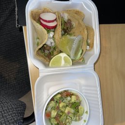 2 carne asada (steak) and 1 Al pastor (pork) tacos, fresh Chips with Guacamole 2 carne asada (steak) and 1 Al pastor (pork) tacos, fresh Chips with Guacamole