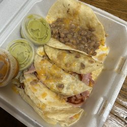Mi Cocinita Taquería - Pinto beans and cheese taco? And the bacon that I ordered was all ham.