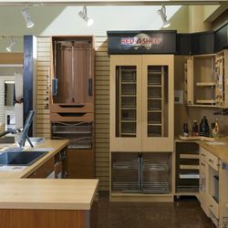 National Builders Hardware - NBH showroom display of cabinet and closet organizers by Rev-A-Shelf.