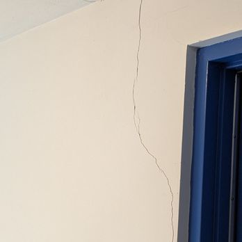 Ejr Real Estate - Crack in ceiling of unit extending to the front door. As you can guess, yes, this crack as been growing. - Real Estate Services Near Me - Newton, Massachusetts Ejr Real Estate - Crack in ceiling of unit extending to the front door. As you can guess, yes, this crack as been growing. - Real Estate Services Near Me - Newton, Massachusetts