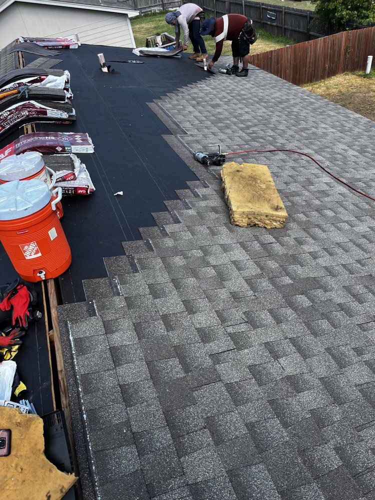 Slide of VG Roofing Service