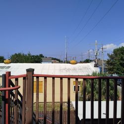Site 61 Hostel - The second floor balcony. The backyard space below can comfortably host 8-10 people. The balcony is mostly occupied by smokers.