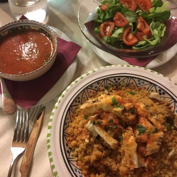 Sfizi e Delizie - Couscous with fish fillet and tomato fish broth. Green and tomato salad - Mediterranean Near Me - Valderice, TP