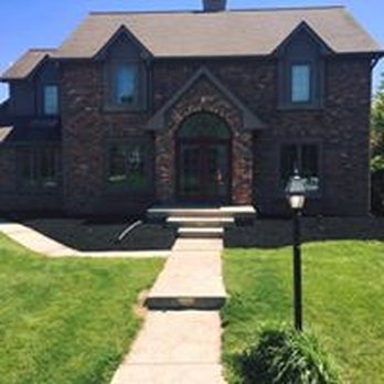 Ez-Scapes - the front of a brick house - Landscaping Near Me - Westfield, Indiana Ez-Scapes - the front of a brick house - Landscaping Near Me - Westfield, Indiana