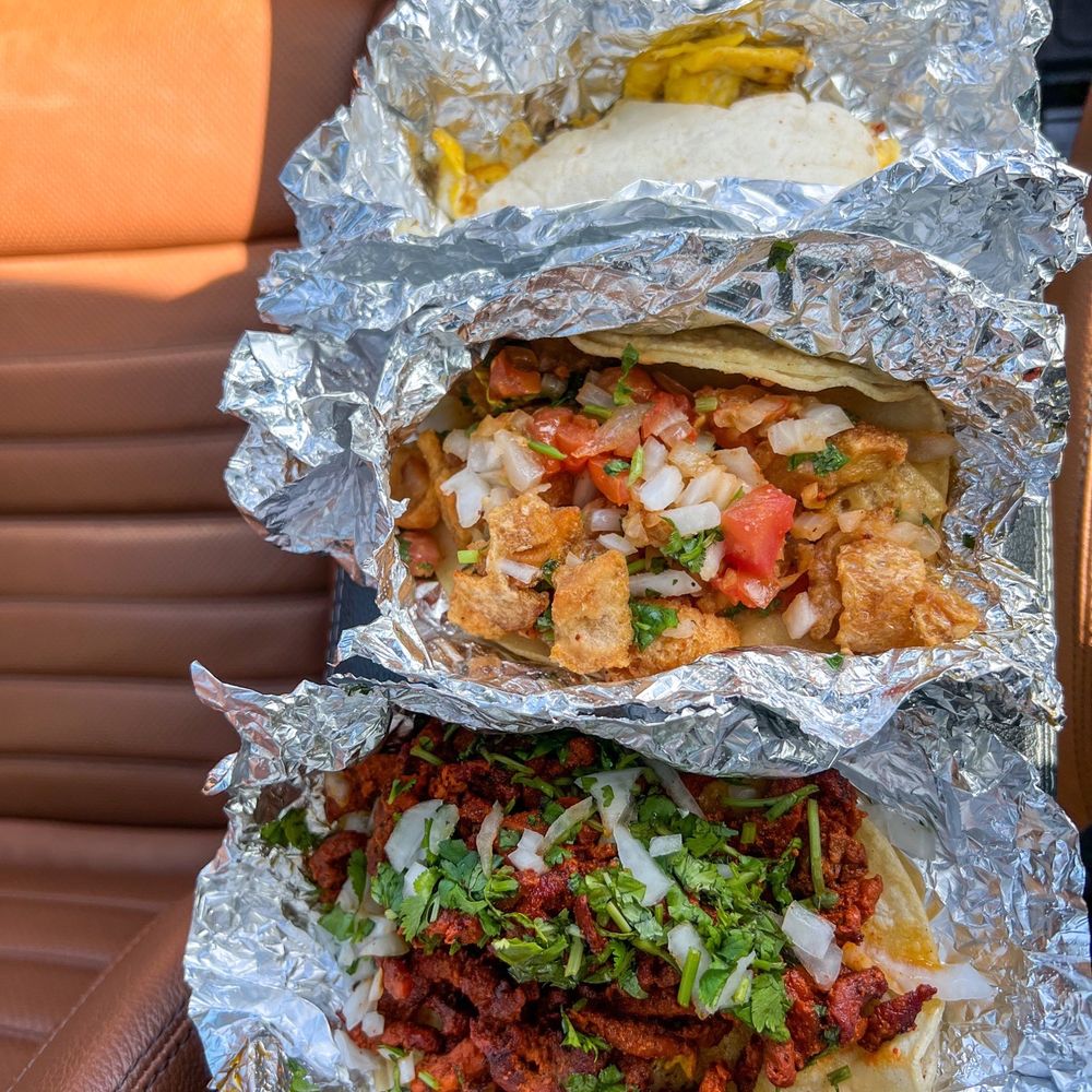 Bella Tacos - From front: Al pastor, Chicharon a la Mexicana, breakfast tacos - all were delicious - Food Trucks Near Me - Cedar Park, Texas