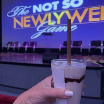 Norwegian Cruise Line - One of the many game shows on the cruise and a yummy Bushwacker to drink. - Travel Services Near Me Norwegian Cruise Line - One of the many game shows on the cruise and a yummy Bushwacker to drink. - Travel Services Near Me
