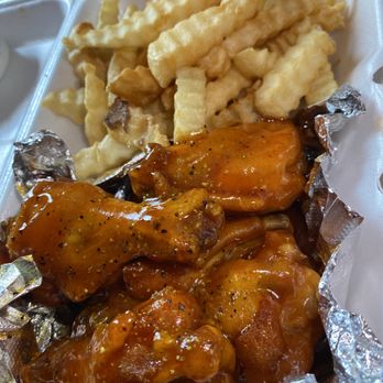 Flava Shack - chicken wings and french fries in a styrofoam container - Burgers Near Me - Forest, Mississippi Flava Shack - chicken wings and french fries in a styrofoam container - Burgers Near Me - Forest, Mississippi