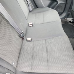 Europcar Car Rental - Dirt stains on the back seat.