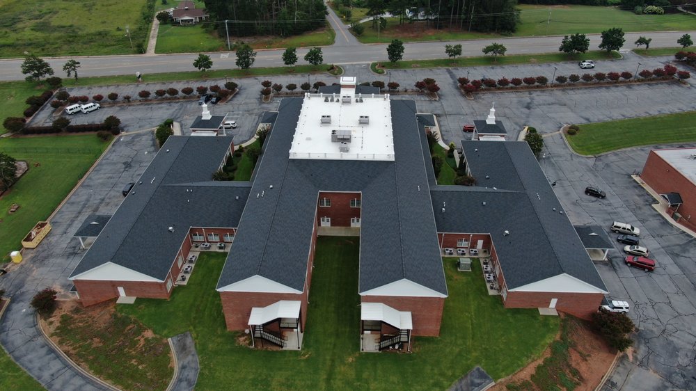 Slide of Allcon Roofing