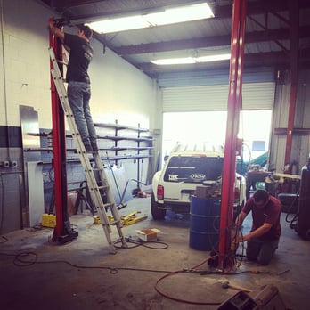 TRAC Performance - Installing the lift inside the shop - Auto Repair Near Me - El Cajon, California TRAC Performance - Installing the lift inside the shop - Auto Repair Near Me - El Cajon, California