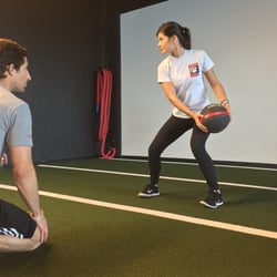 Some Kinetic Linking with rotary power using medballs, the turf and our med ball wall!