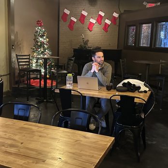 Levi & Lilac's Coffee Pub - a man working on his laptop - Coffee & Tea Near Me - Maumee, Ohio Levi & Lilac's Coffee Pub - a man working on his laptop - Coffee & Tea Near Me - Maumee, Ohio