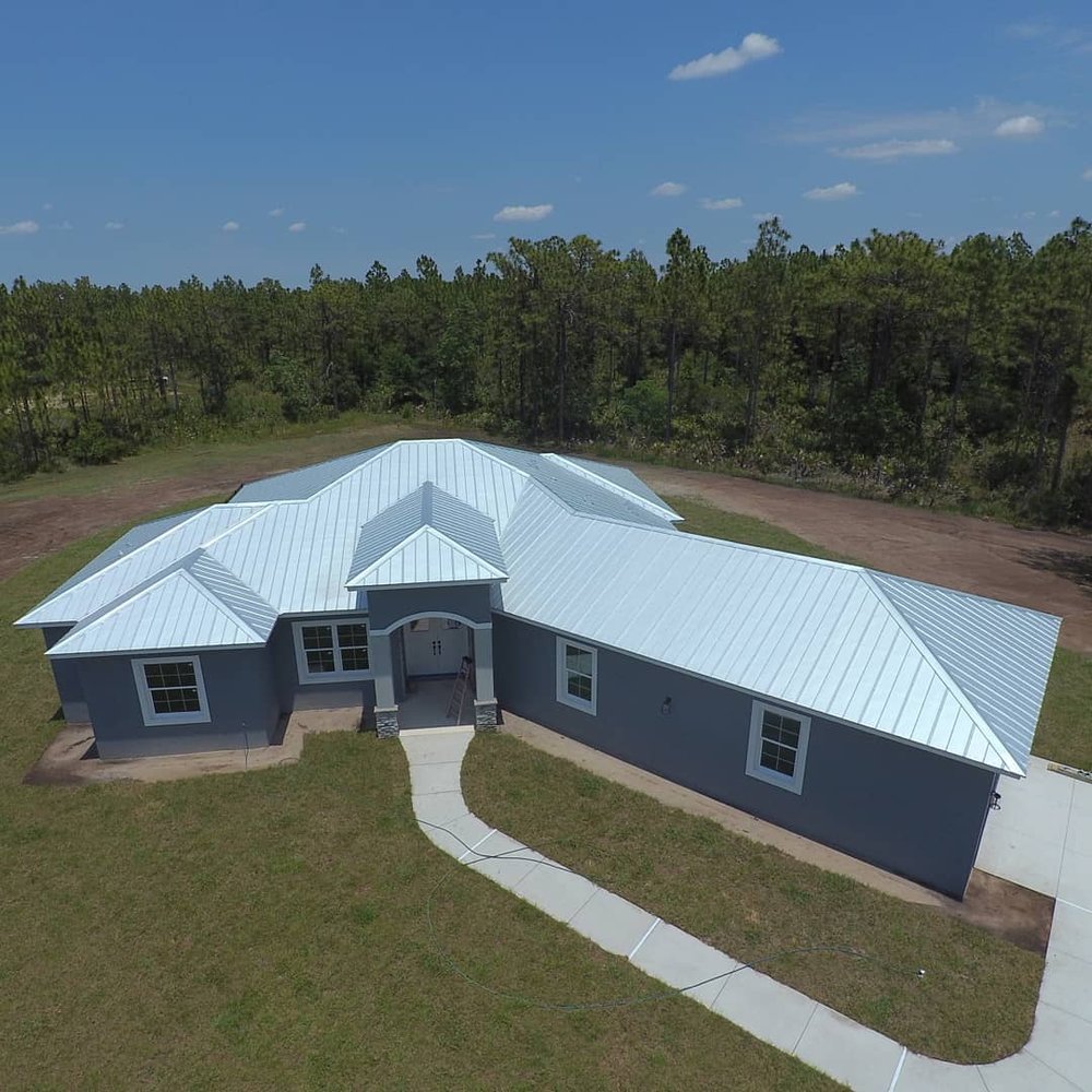 Slide of Florida Roof Bros