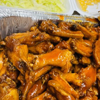 Country Wings - a tray of chicken wings with a side of coleslaw - Chicken Wings Near Me - Columbus, Georgia Country Wings - a tray of chicken wings with a side of coleslaw - Chicken Wings Near Me - Columbus, Georgia