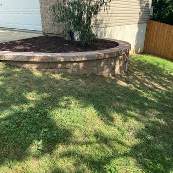 Dreamscapes Outdoor Services - New bed near the driveway. - Landscaping Near Me