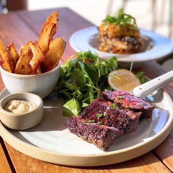 Roger Bar & Restaurant - Flank + Fries w/ coffee+pepper rub, watercress salad, thyme aioli ($32) & Moroccan Corn Ribs w/ sunflower seeds, feta, sumac ($7) - New American Near Me - Mountain View, California