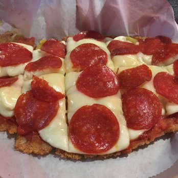Double Barrel Bar And Grill - Tenderloin "pizza" with pepperoni, onion, and banana peppers - Bars Near Me - Tiffin, Ohio
