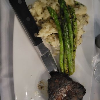 The Chop House On Main - a steak, mashed potatoes, and asparagus - Steakhouses Near Me - Jamestown, New York