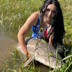 Adventures With Mayhem Outfitters - Monster sturgeon caught today by the lovely Erica T. What a catch.