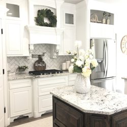 Home Stone Granite - This is White Ice granite featured in this beautiful home with square cut on the edges.